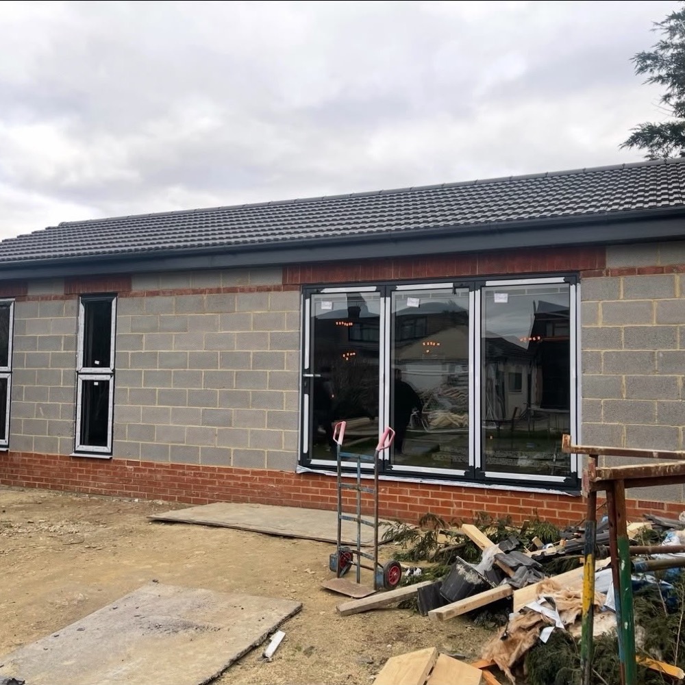 New build with roof tiled and windows fitted