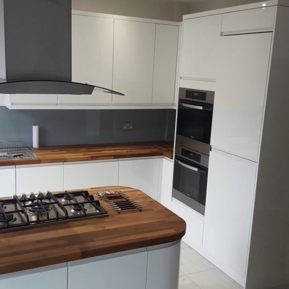 Fitted kitchen with walnut worktops
